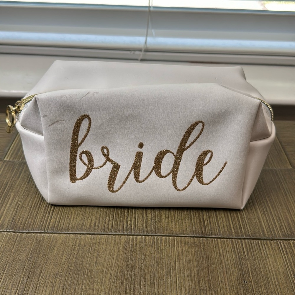 Bride make up bag.  White/Gold wrtiting. Never used. Smoke/Pet-Free home.